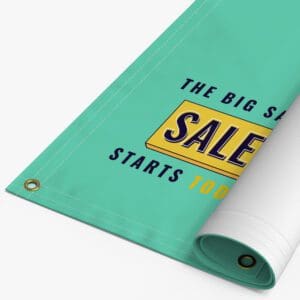 A roll of green fabric with the words " sale starts here ".