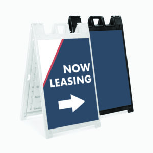 A-frame sign with arrow and now leasing