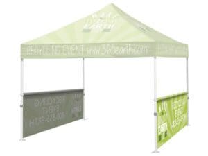 A canopy with a wall and side panels